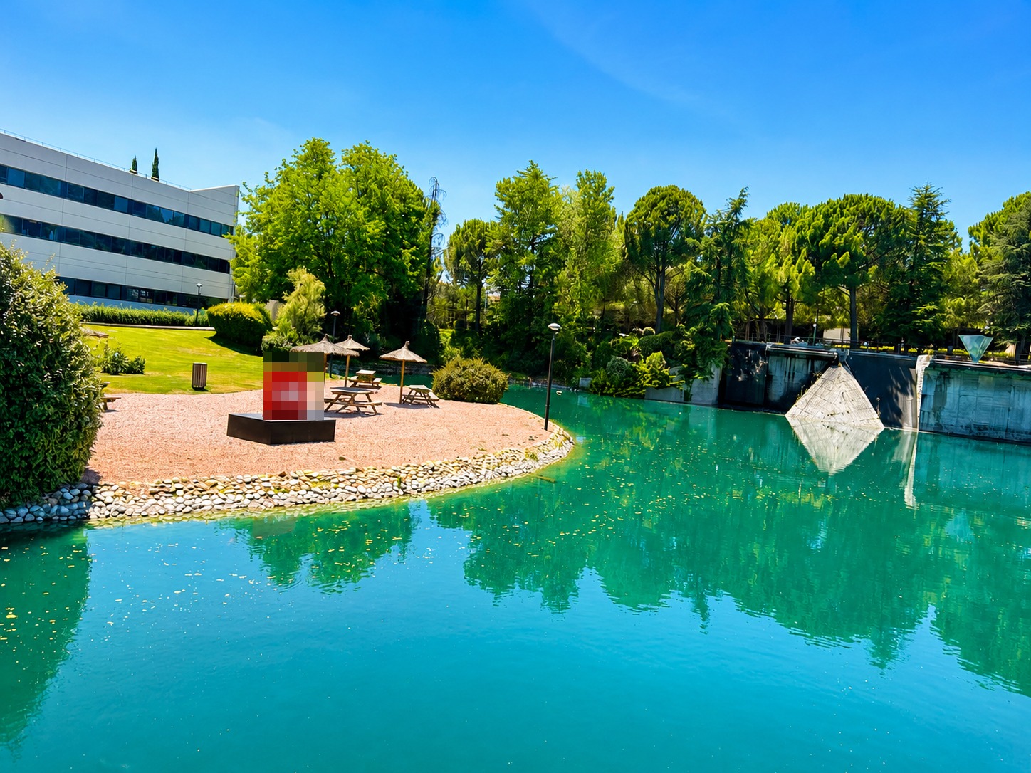 UE sign and lake on Universidad Europea de Madrid campus